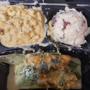 Something new: stuffed chicken with a side of Mac &amp; Cheese and a side of Red Skin Mashed Potatoes.