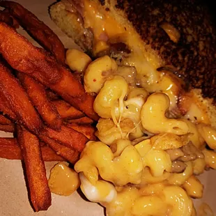 Club sandwich on Texas toast, sweet potato fries and Cheesy Lisa Mac n&apos; cheese.