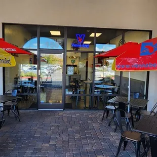 tables and umbrellas outside