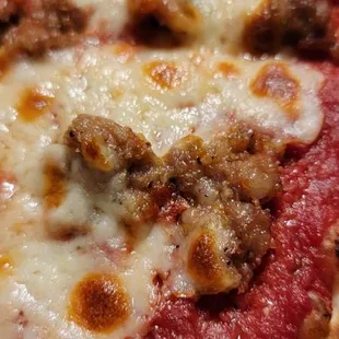a close up of a pizza