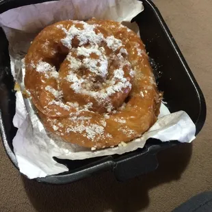 Apple and cinnamon filled phyllo swirl topped with Caramel and powdered sugar
