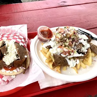 two plates of food on a picnic table