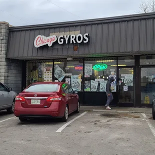 a car parked in front of the store