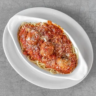 a plate of spaghetti and meat