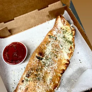 Calzone with marinara sauce