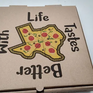 a box with a slice of pizza