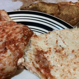 Raw , uncooked dough inside of calzone