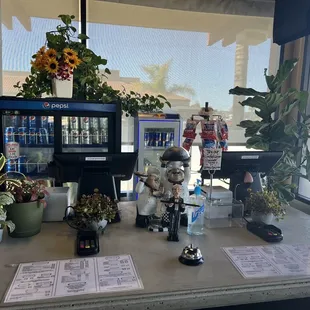 a display of sodas and soda machines