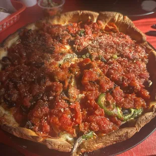 The Deluxe. Mushrooms, onions. Bell peppers, sausage, pepperoni.