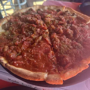 The Lobo. Pepperoni, sausage and green chile.