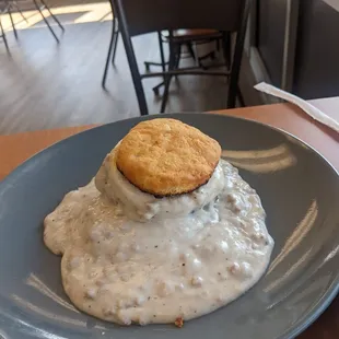 Chicken, gravy, egg on a biscuit