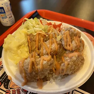 a plate of food on a tray