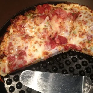 Deep dish ham, pineapple, green peppers.