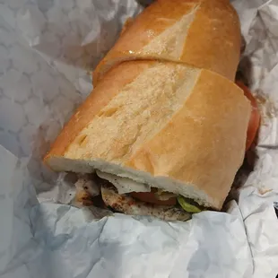 Chicken Classic sandwich: Grilled chicken breast, with lettuce and tomato, I added onions and I think it came with mayo. $9.50 10 out 10