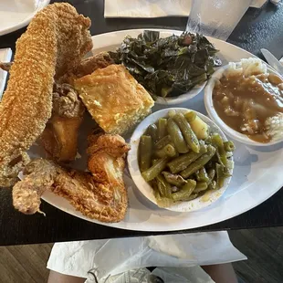 Catfish + wings. Green beans, rice and gravy, collards. I&apos;d get everything but the collards again.