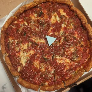 Deep Dish: pepperoni, ground beef, mushrooms and spinach