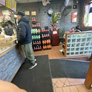 a man standing at a counter