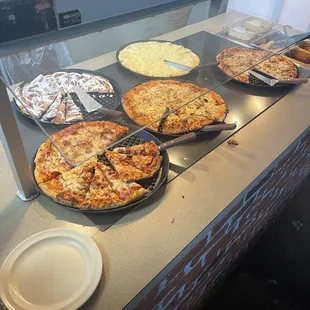One pizza bar with bread sticks on the end