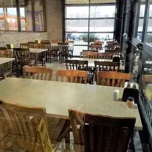 additional seating with garage doors that open in season