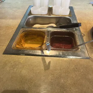 Breadsticks with nacho cheese and marinara.