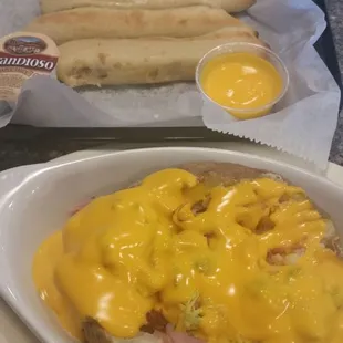 Baked potato and breadstix.  Cannot go wrong with carbs and more carbs.
