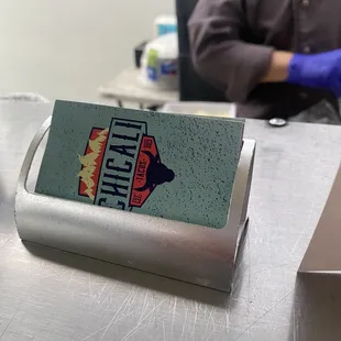 a business card holder on a table