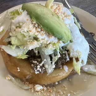 a plate of food with a fork and knife