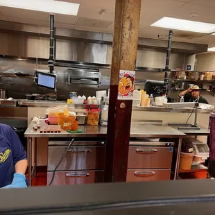 a woman in a restaurant kitchen