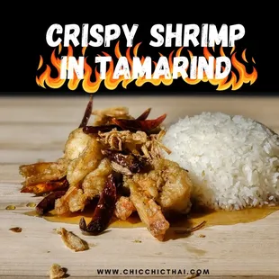 shrimp and rice on a wooden table