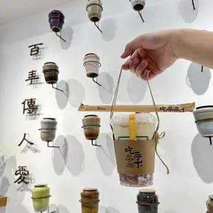 Green tea with fresh milk and taro ball