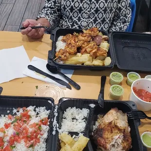 Camarrones Al Grill with fried yucca and roasted potatoes, and quarter chicken white with fried yucca and white rice, plus pico
