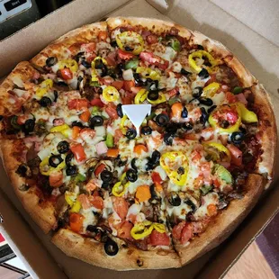 All the Way: marinara, pepperoni, sausage, ham, bacon, beef, red, green &amp; banana peppers, onions, mushrooms, olives, tomatoes