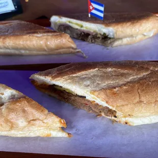 a cut in half sandwich on a tray