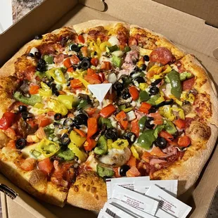 Garden veggie pizza with ham, bacon and sausage