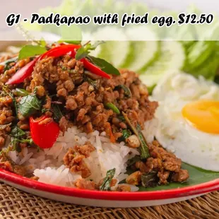 a plate of rice and a fried egg