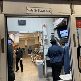 ows a woman entering a store