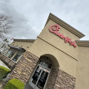ows the entrance to a chick - fil - a - fil restaurant