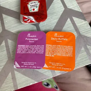 ows two packets of ketchup and a bottle of ketchup
