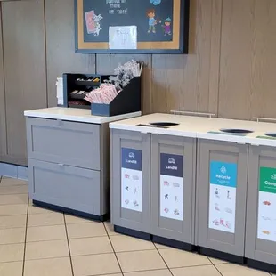 ows a check - in counter with a chalkboard on the wall