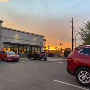 Beautiful sunset waiting for my large order at chick-fil-a