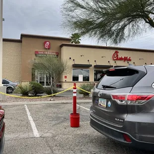 ows a car parked in a parking lot
