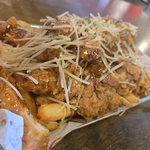 Spicy honey garlic chicken and fries