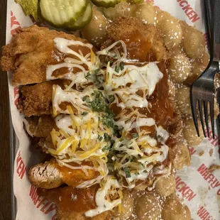 Canadian Buffalo:  bubble waffle topped with Buffalo chicken, and some type of maple syrup infused hot sauce.