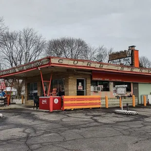 a chick inn in a parking lot