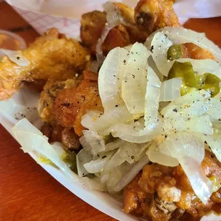 Salt and pepper wings tossed in sauted onions, jalapenos, and garlic