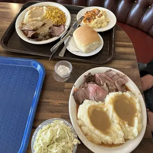 Table top view of roast beef dinners