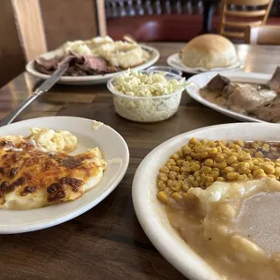 Mac and cheese, Cole slaw, roast beef dinners, bread rolls