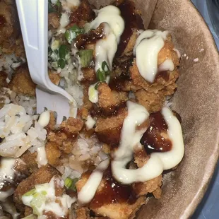 this is just part of my bowl as i already ate half of it lol chicken and rice bowl with Soy Garlic sauce