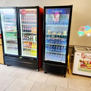 two refrigerated refrigerators in a store