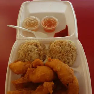 8 chicken tenders with fried rice. Wednesday special with homemade sweet n hot sauce. looks tasty
